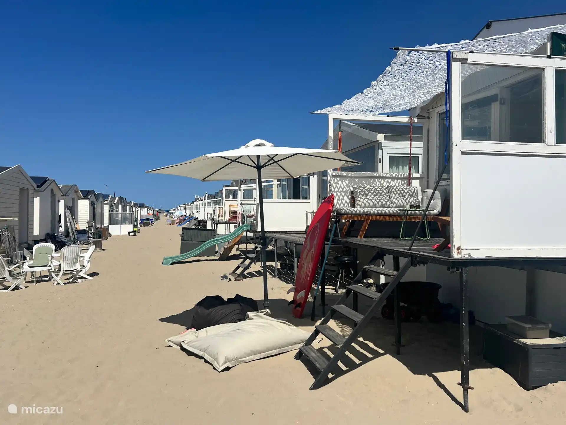 Lekker in het zand voor je huisje