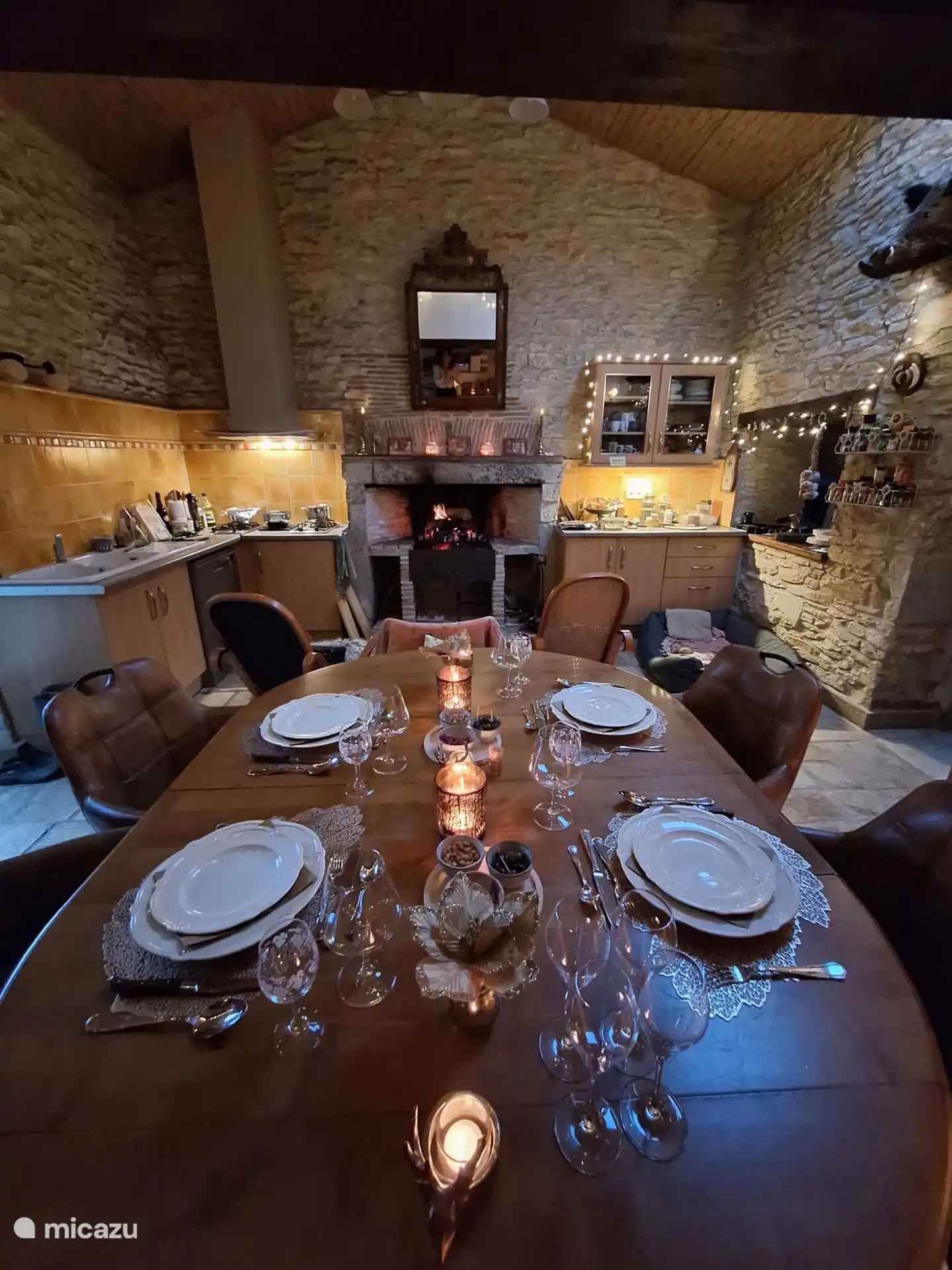 Attractive kitchen with large fireplace