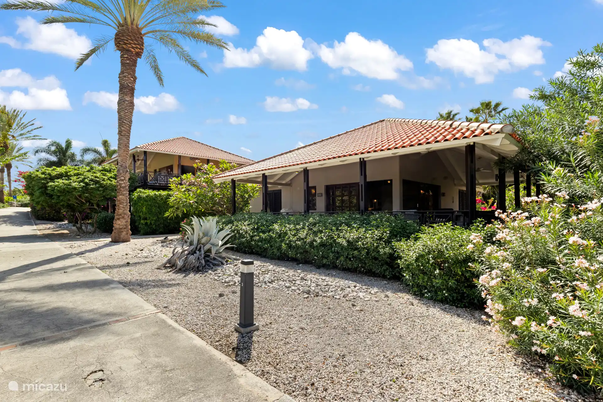 Vrij uitzicht over de golfbaan en flamingo's!