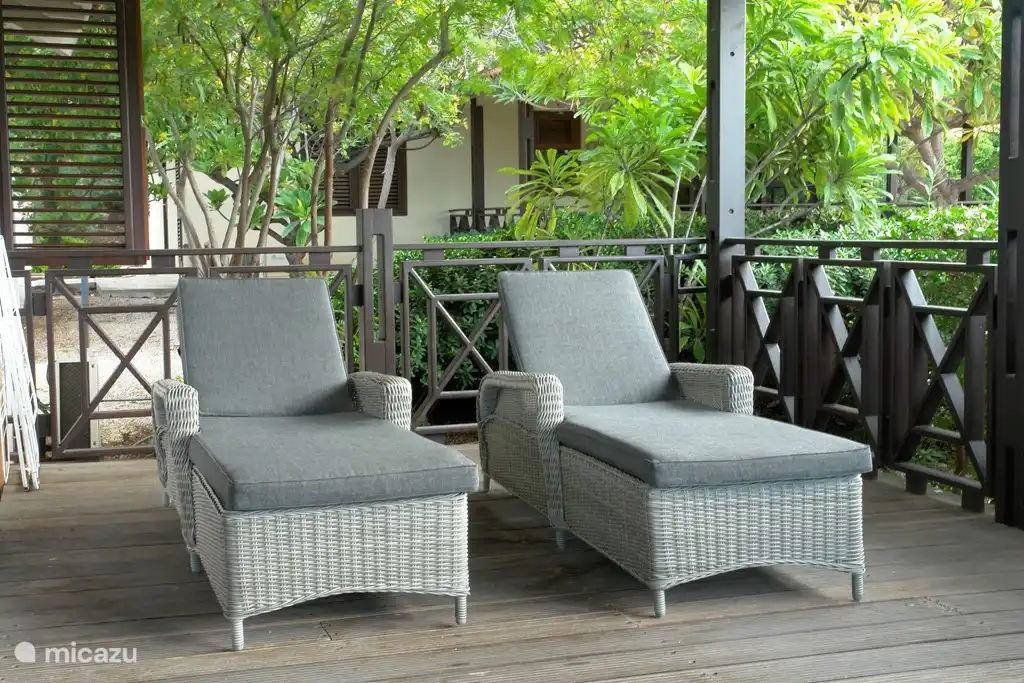 Deck chairs on spacious terrace