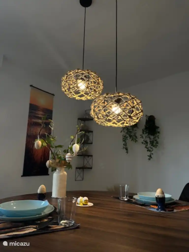 Atmospheric photo in the evening at the dining table. 