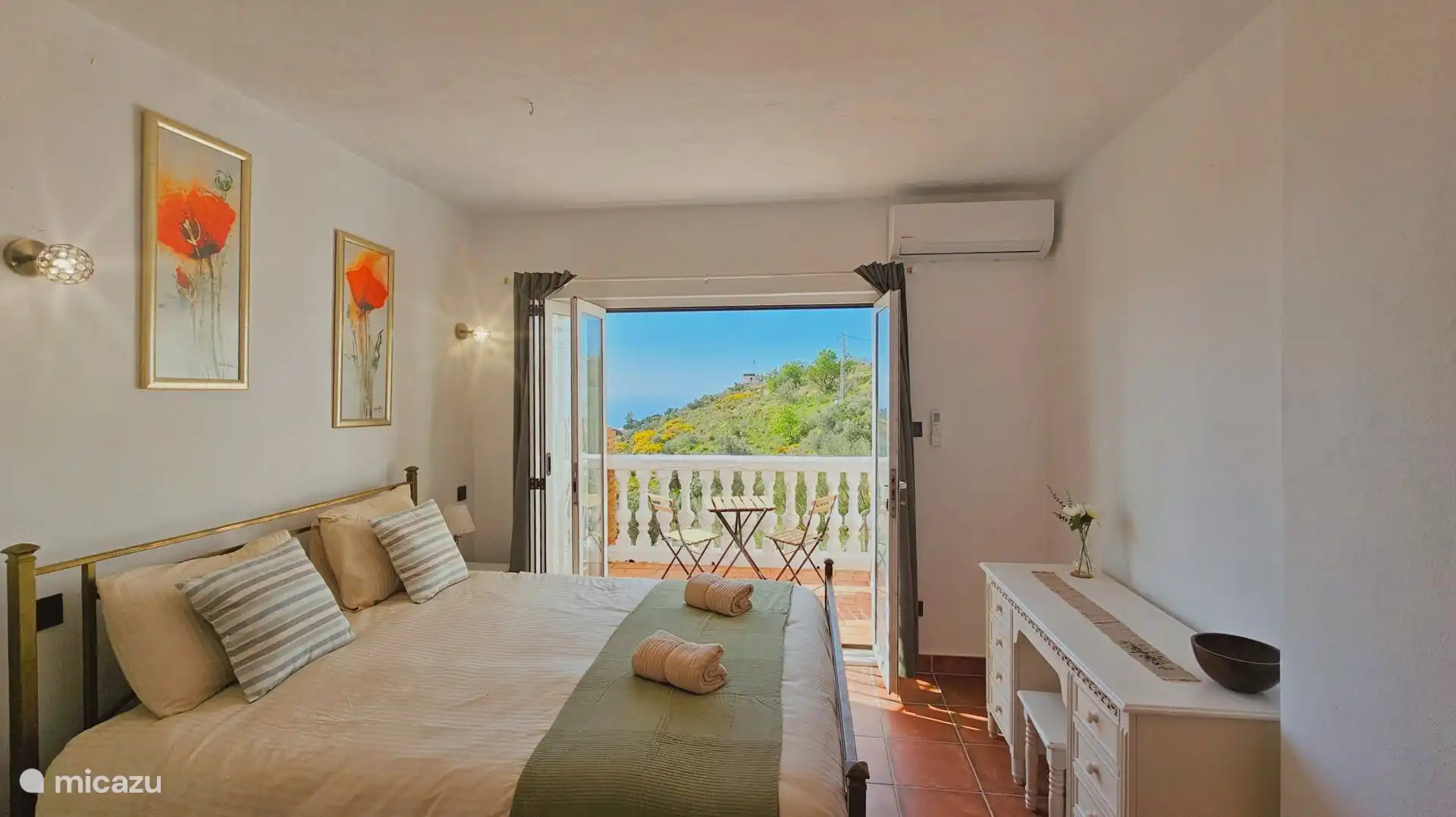 Slaapkamer met terras en badkamer ensuite