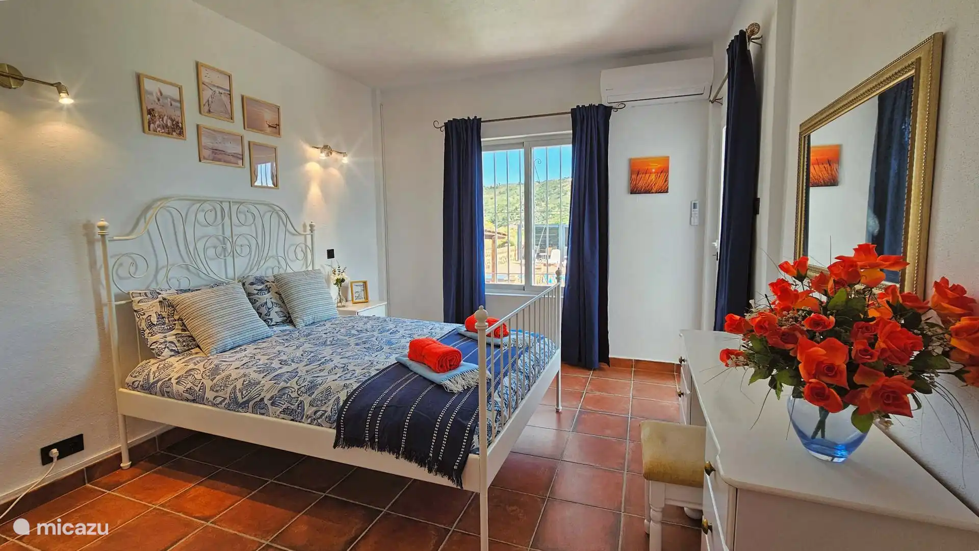 Slaapkamer met balkon