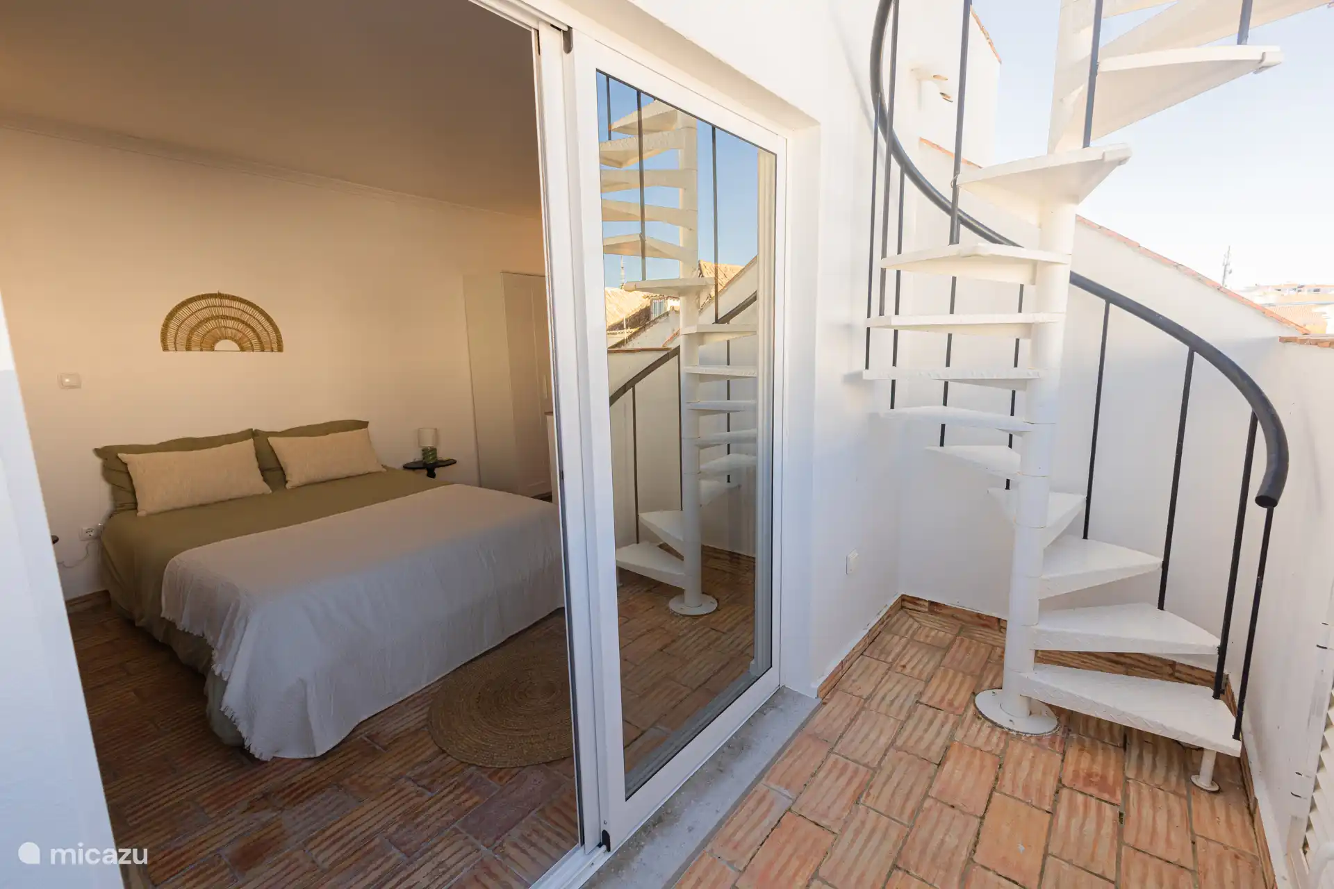 Stairs towards rooftop terrace