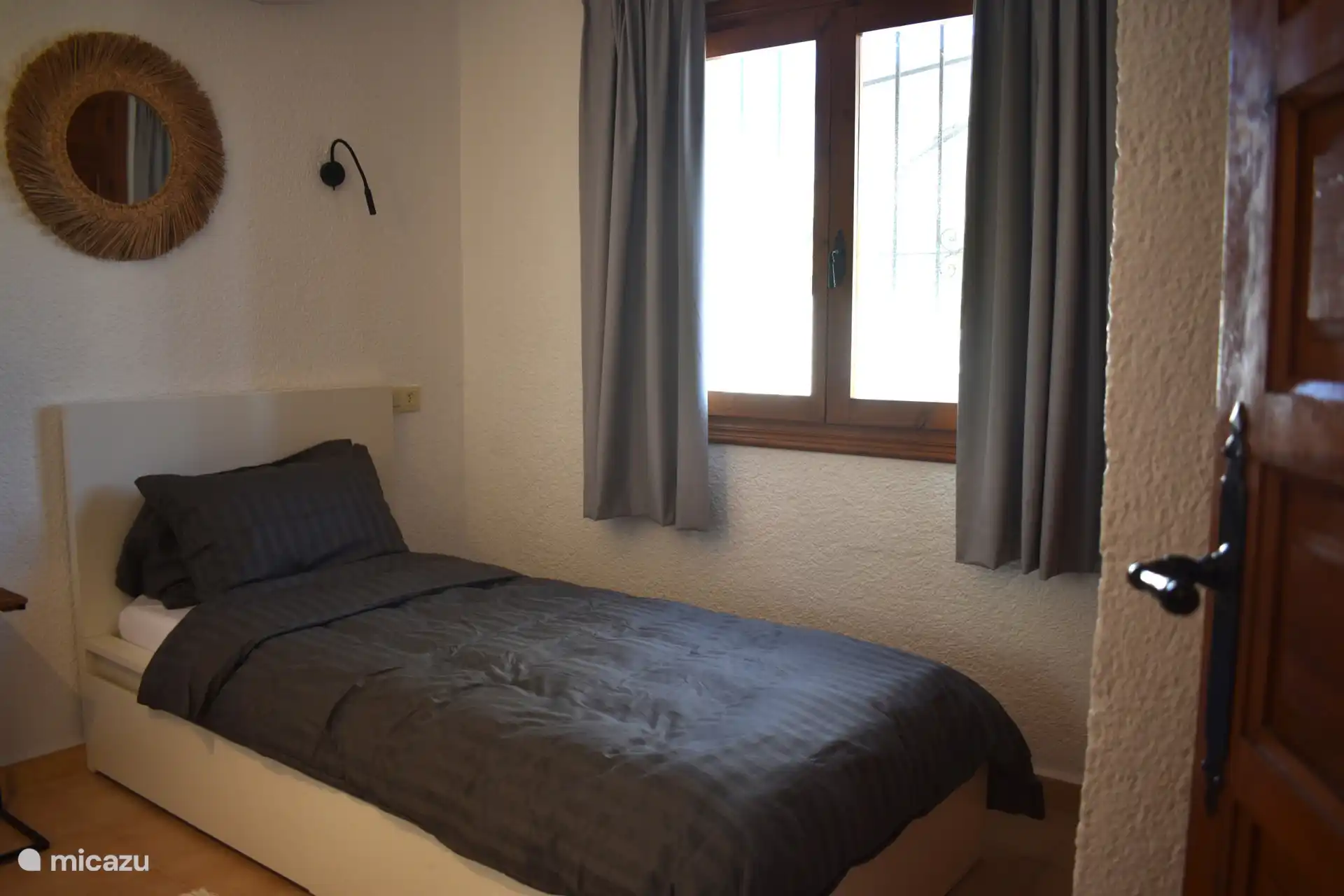 Slaapkamer 3: een 1-persoonsbed (90x200).