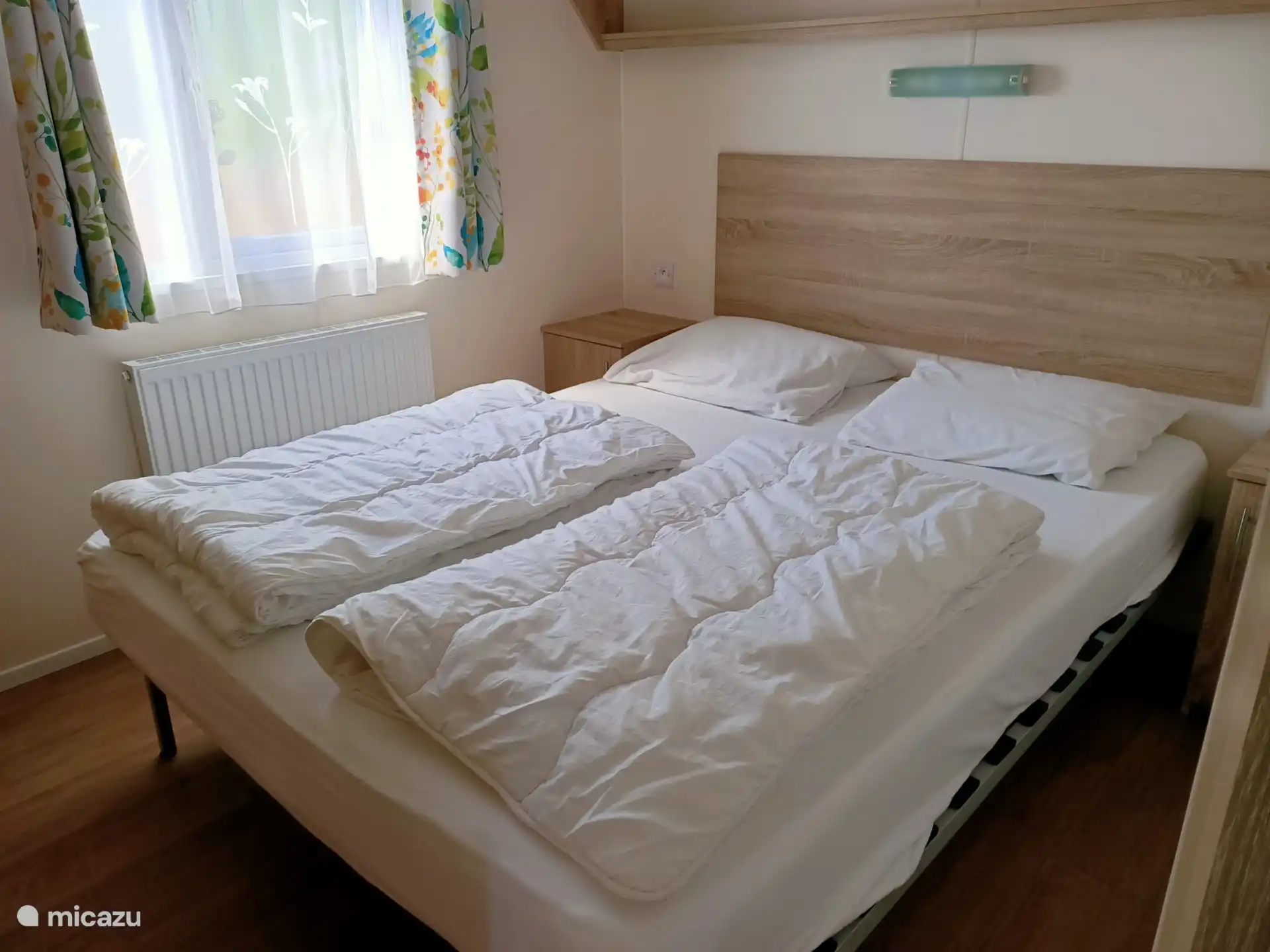 Twee persoonskamer met 1 persoonsdekbedden