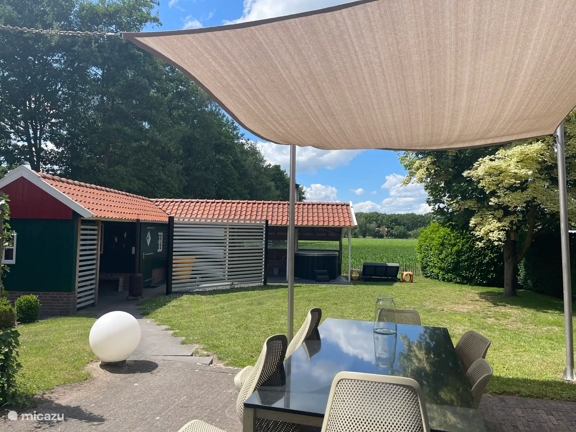 Tuin met vrij uitzicht over de weilanden van de Achterhoek