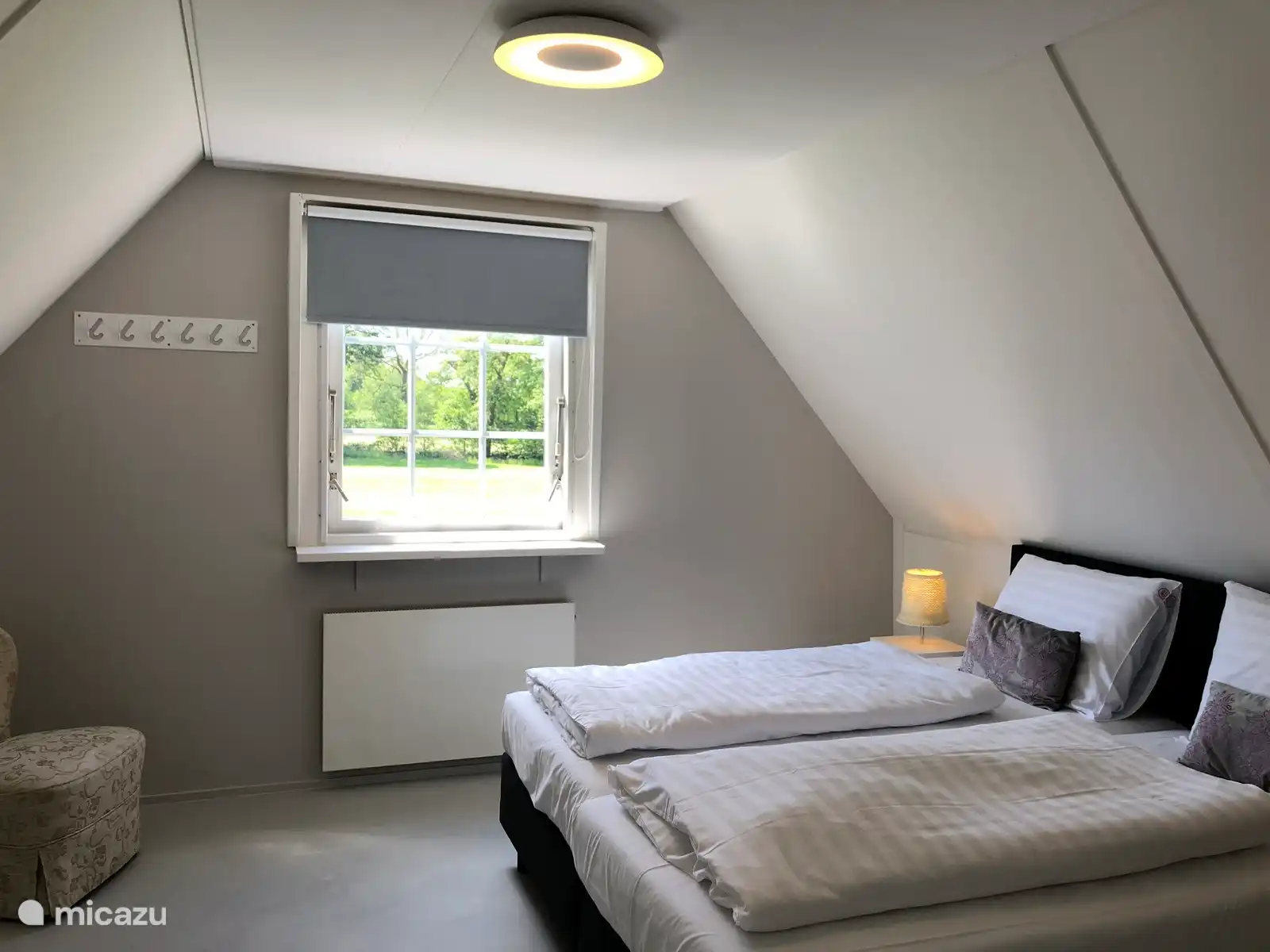 Slaapkamer met uitzicht over de Achterhoekse weilanden