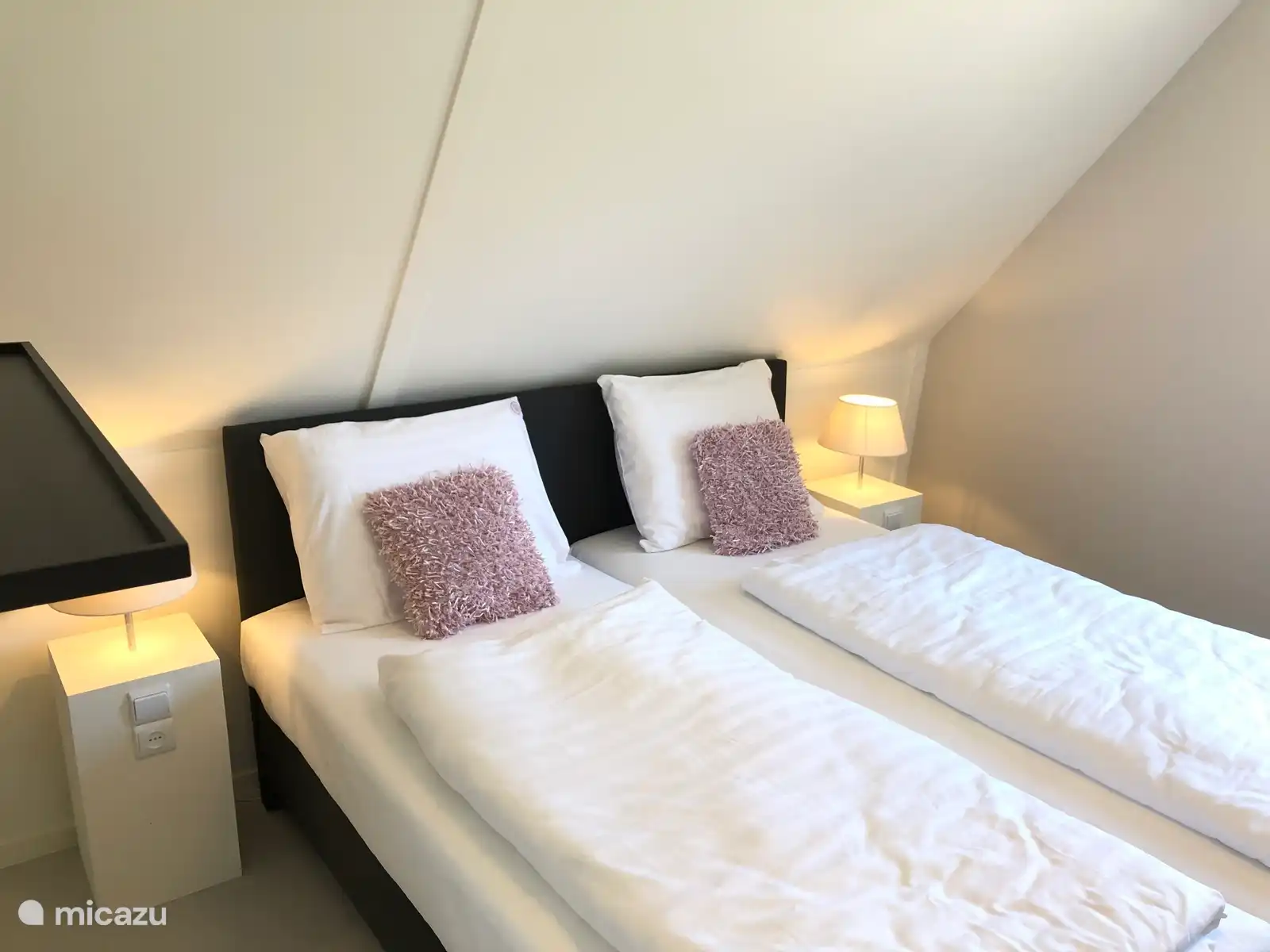 Ruime slaapkamer met heerlijke bedden