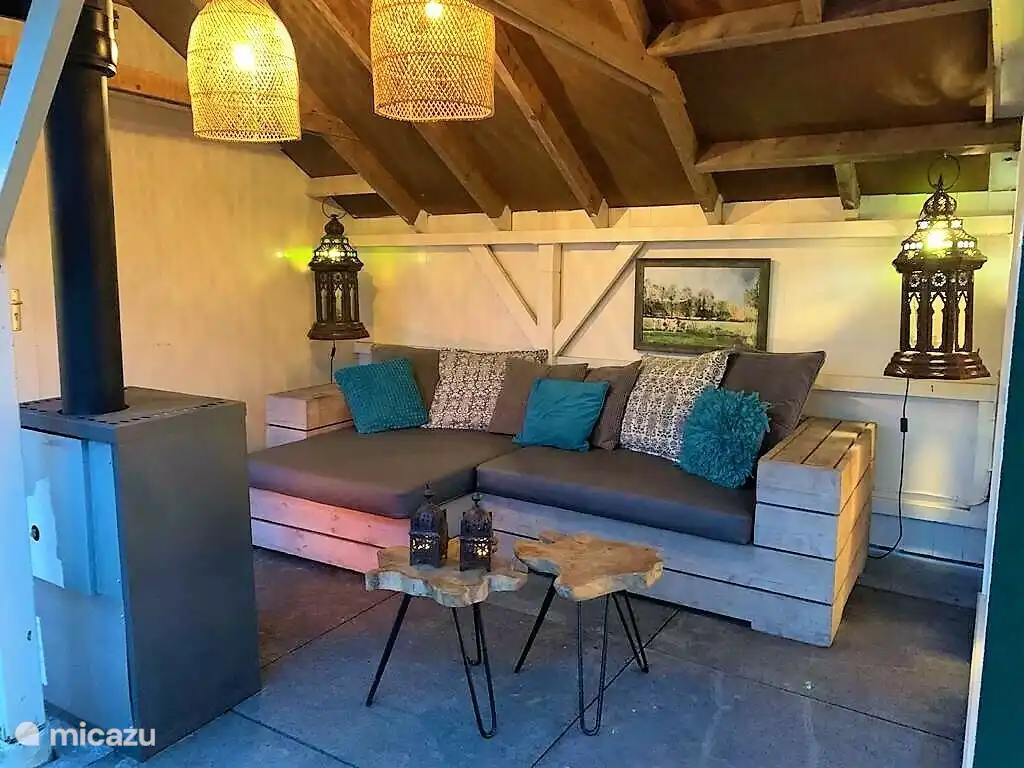 Overdekte buitenzit met openhaard