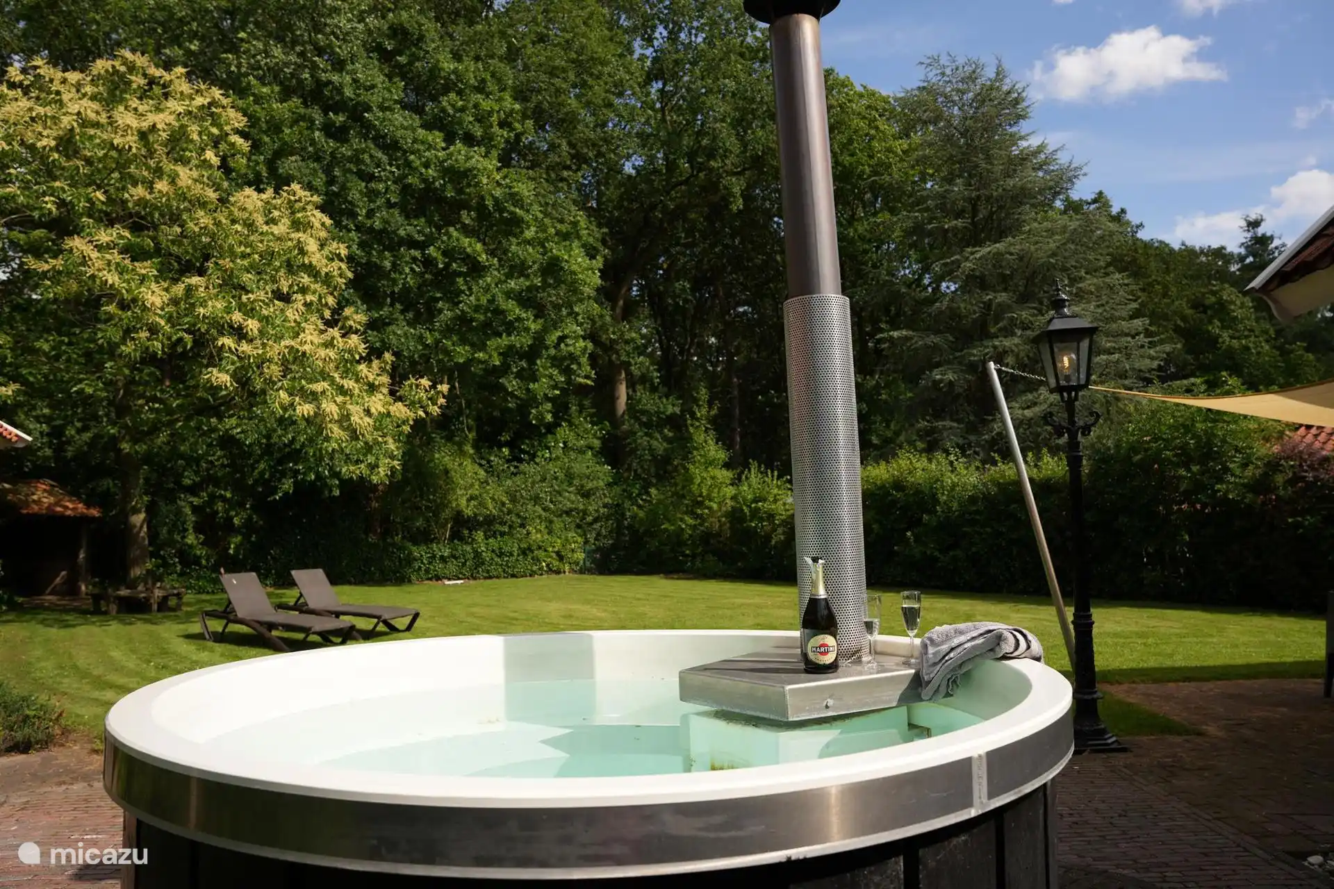 Het uitzicht vanuit de hottub op het bos