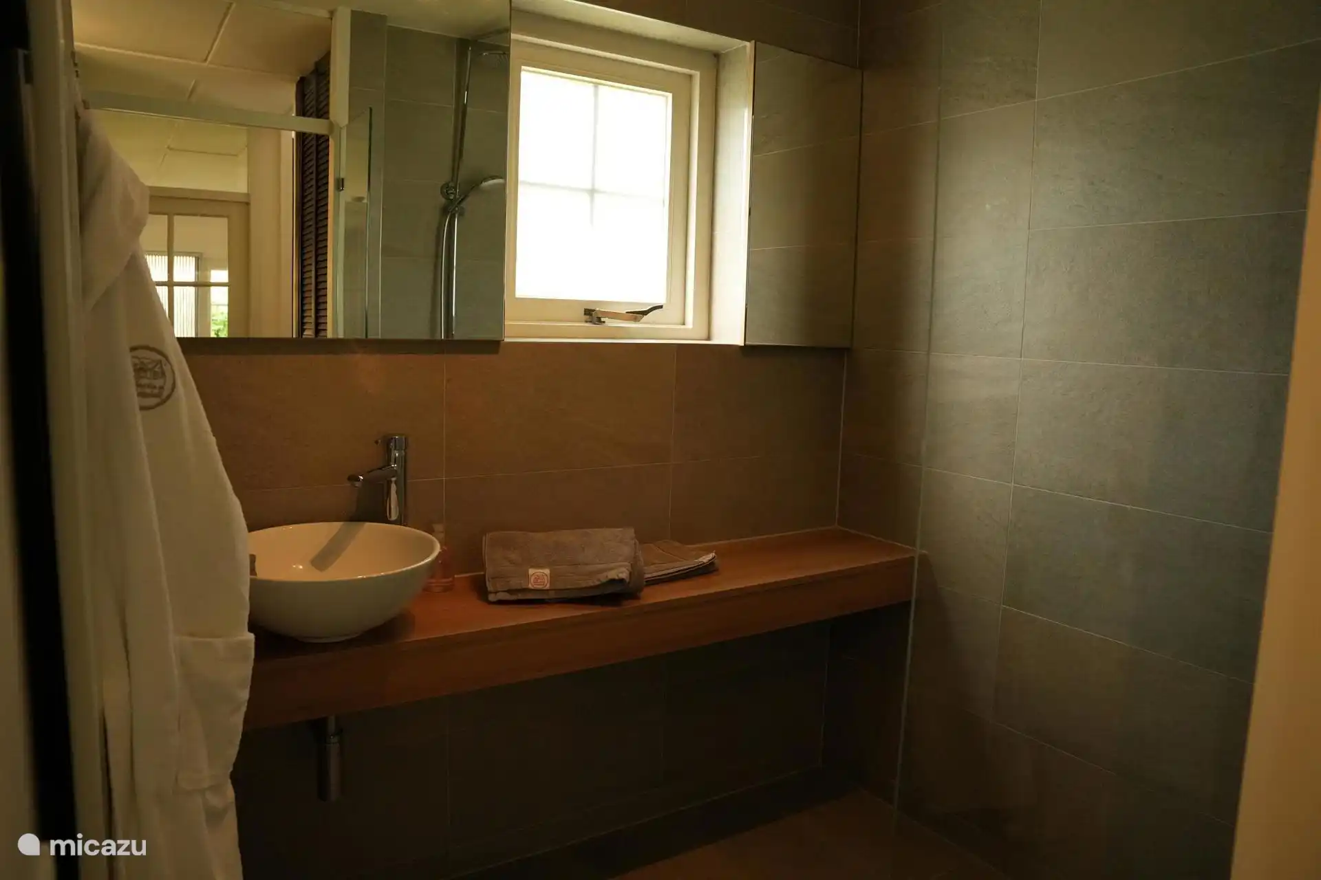 Badkamer met Sunshower