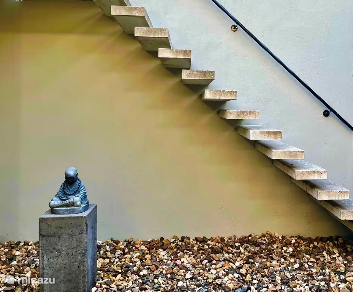 Stairs from terrace below to terrace above