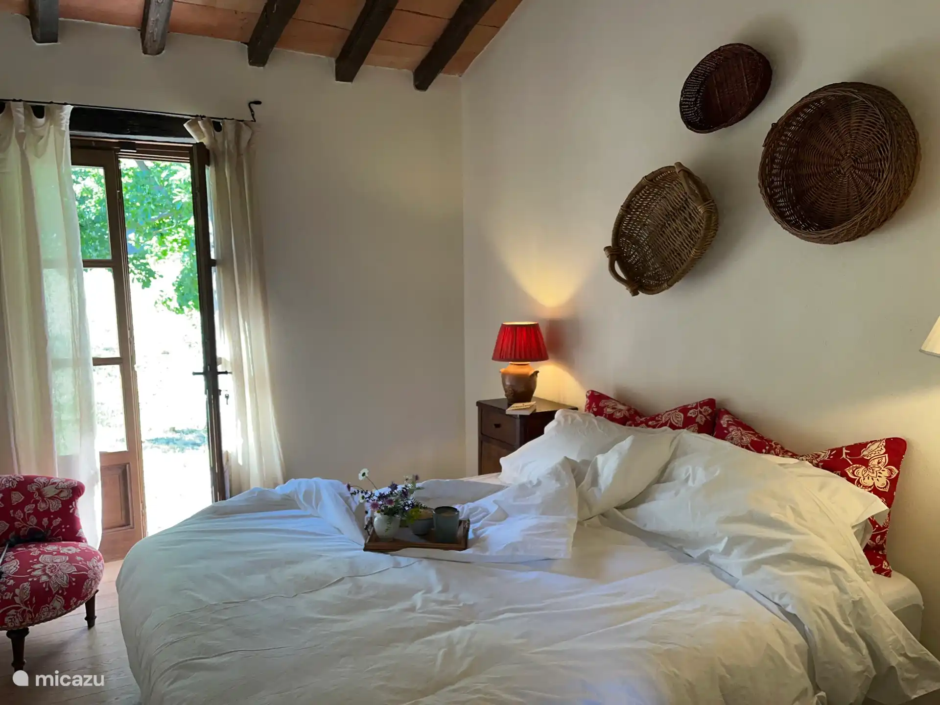 Bedroom adjacent to front garden with orchard