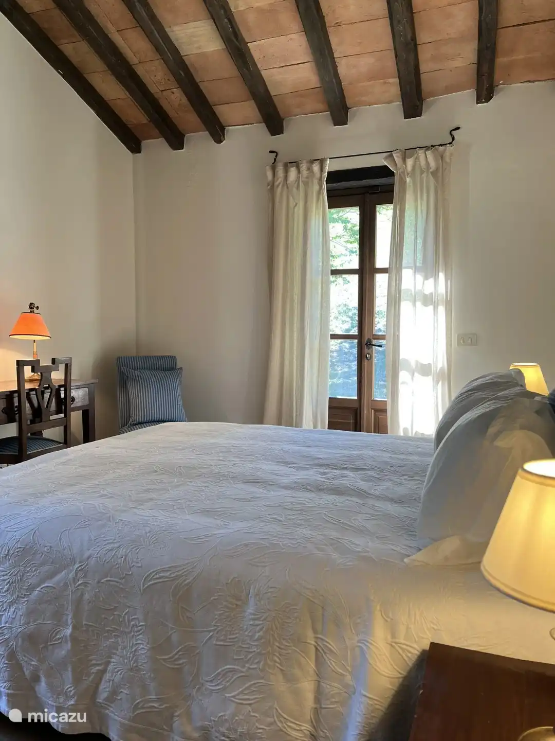 Bedroom with a view of the front garden