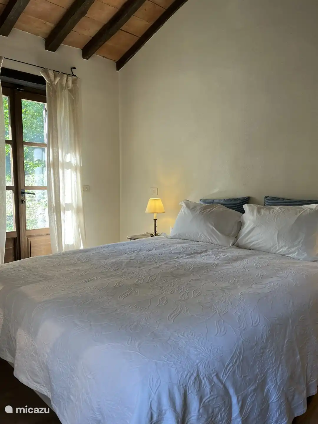 Bedroom adjacent to front garden