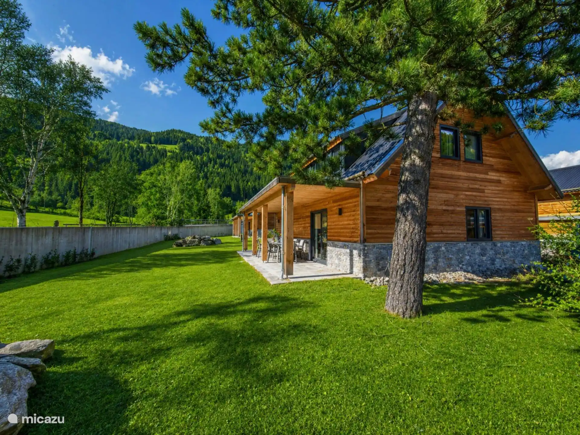 Chalet met uitzicht op de buitenkant