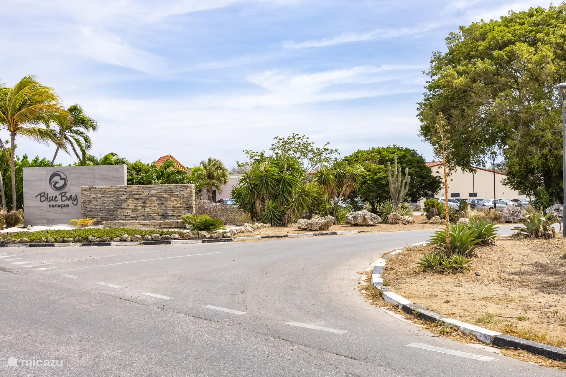 The entrance, just before Bleu Bay Resort, is just before the gated resort with secure gate, and private parking. 