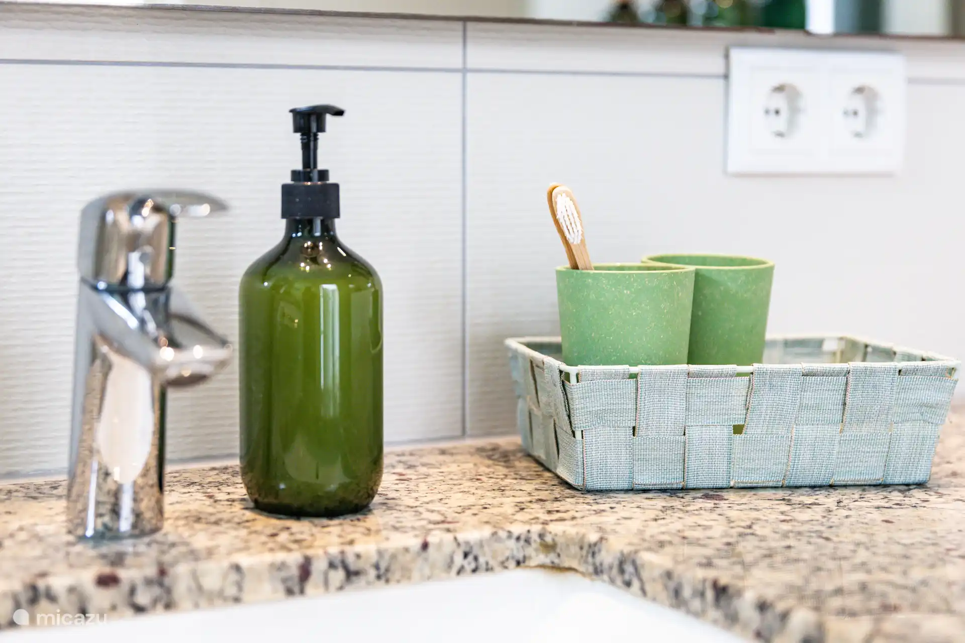 A spacious bathroom with amenities such as shampoo, conditioner and shower gel, washing machine and dryer and of course fine towels. 