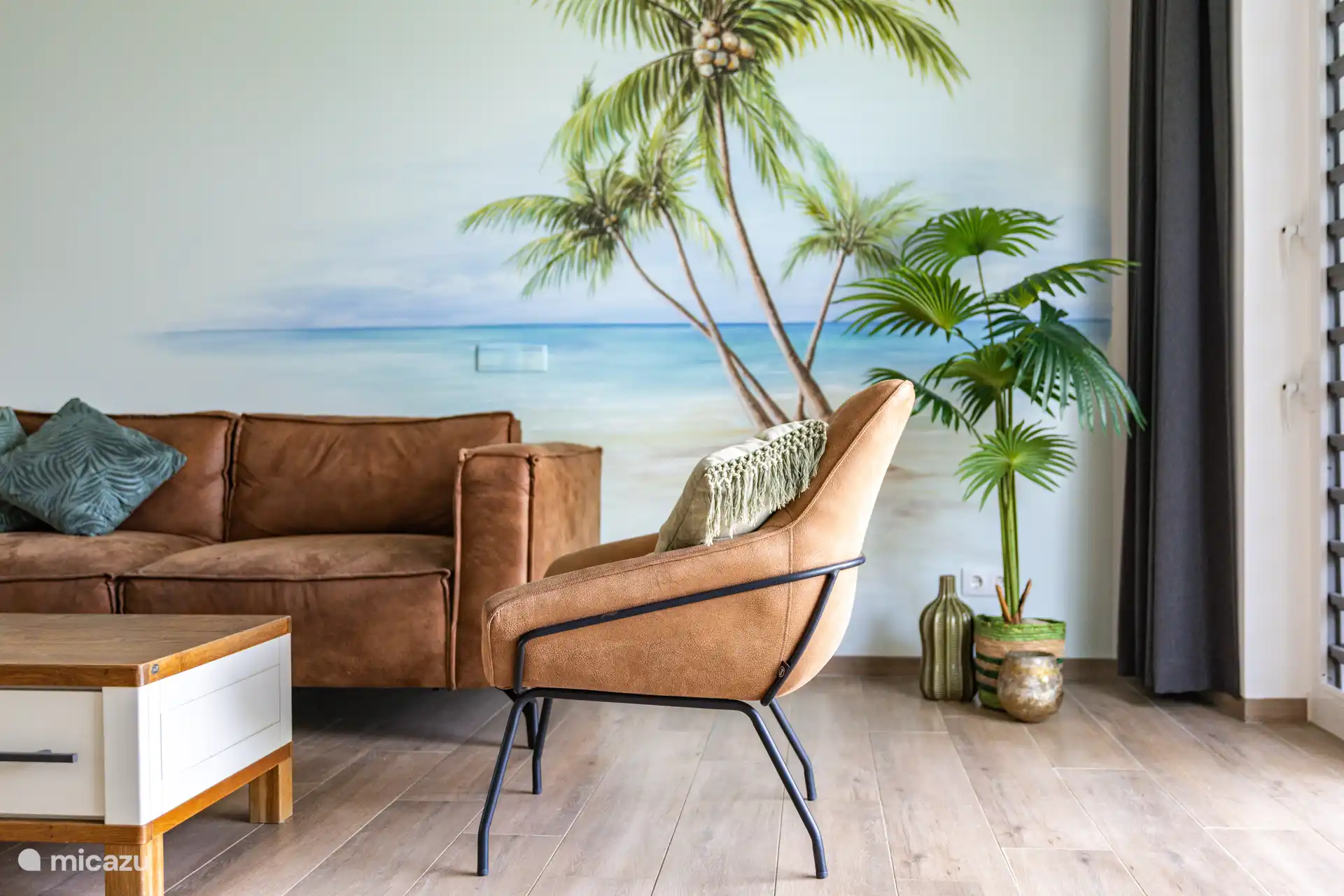 Lovely spacious living room with patio doors to the terrace overlooking the tropical garden and lots of privacy.