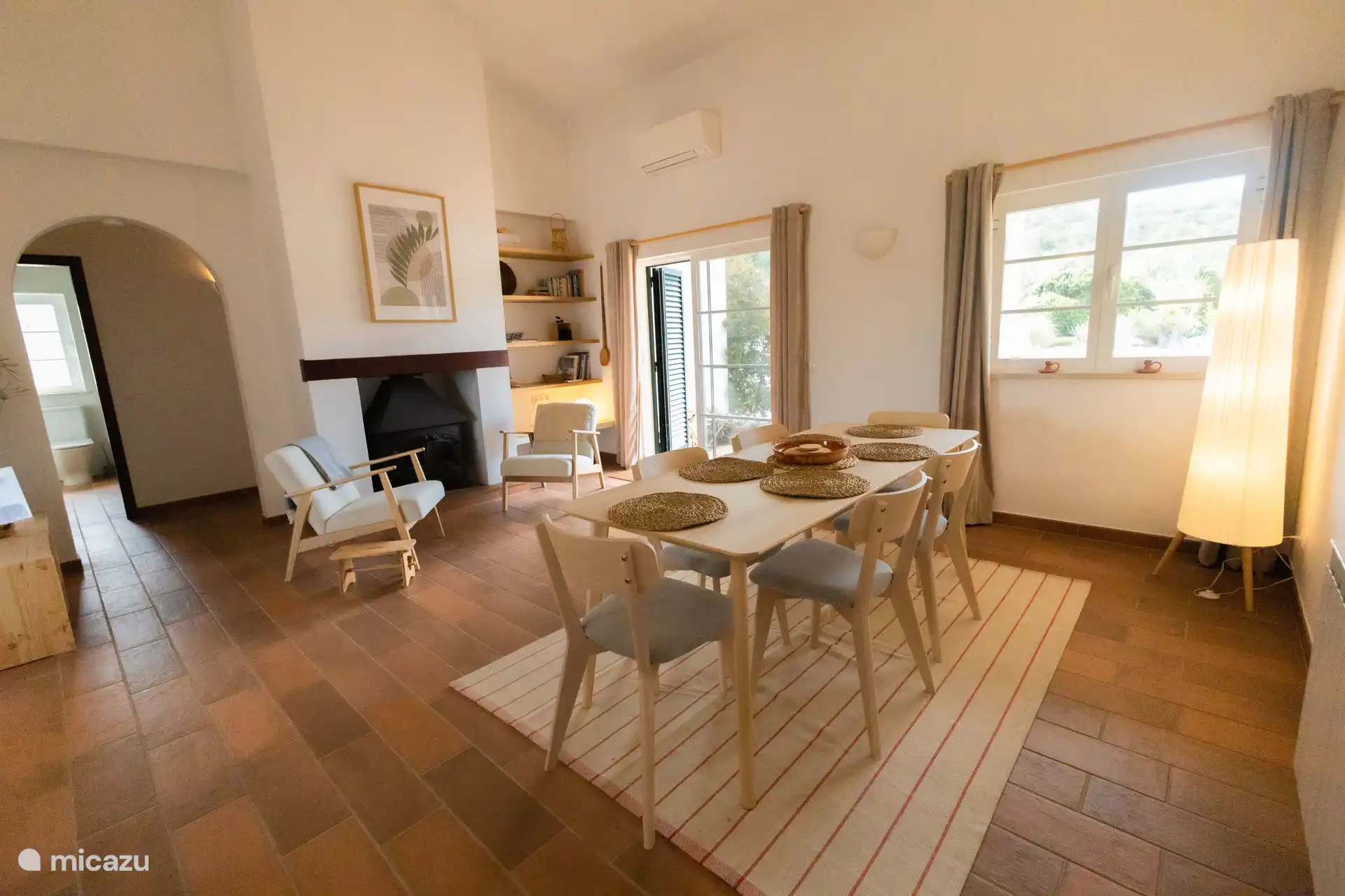 Living room with relax chairs and dining table 