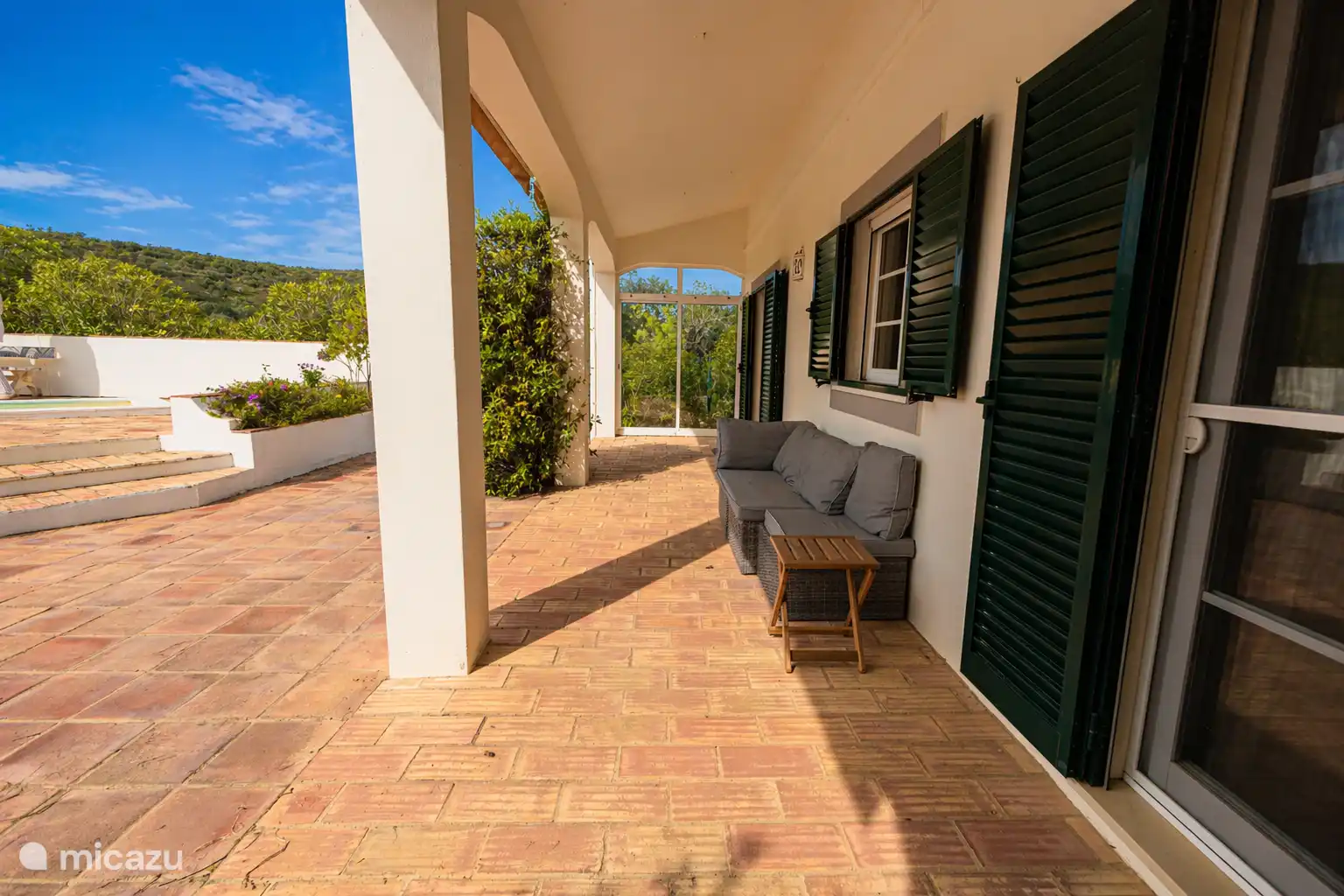 South side villa. Direct access to the pool from the living room.