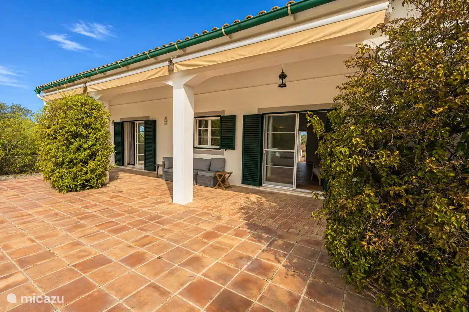South side villa, with awnings against sun. 