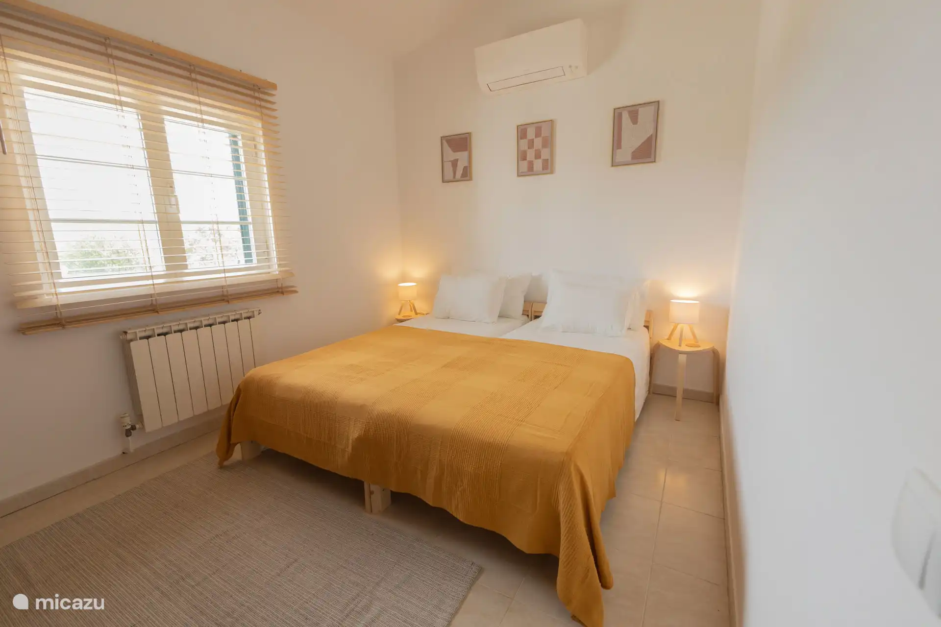 Bedroom 2 with two single beds next to each other. 