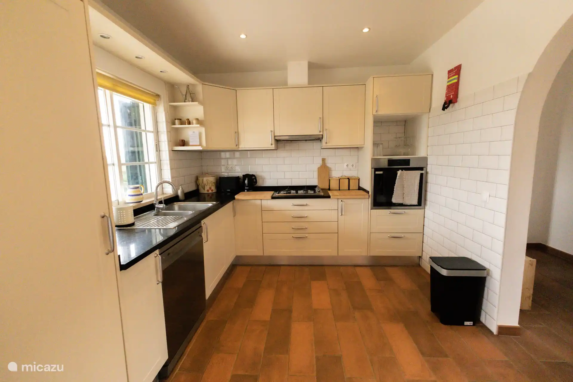 Complete kitchen with dishwasher, oven and refrigerator. 
