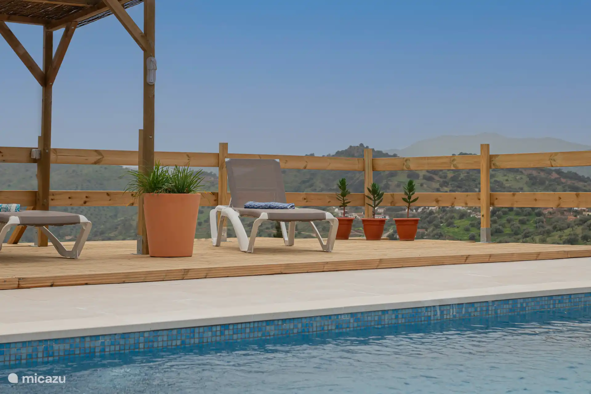 sun terrace with sunbeds
