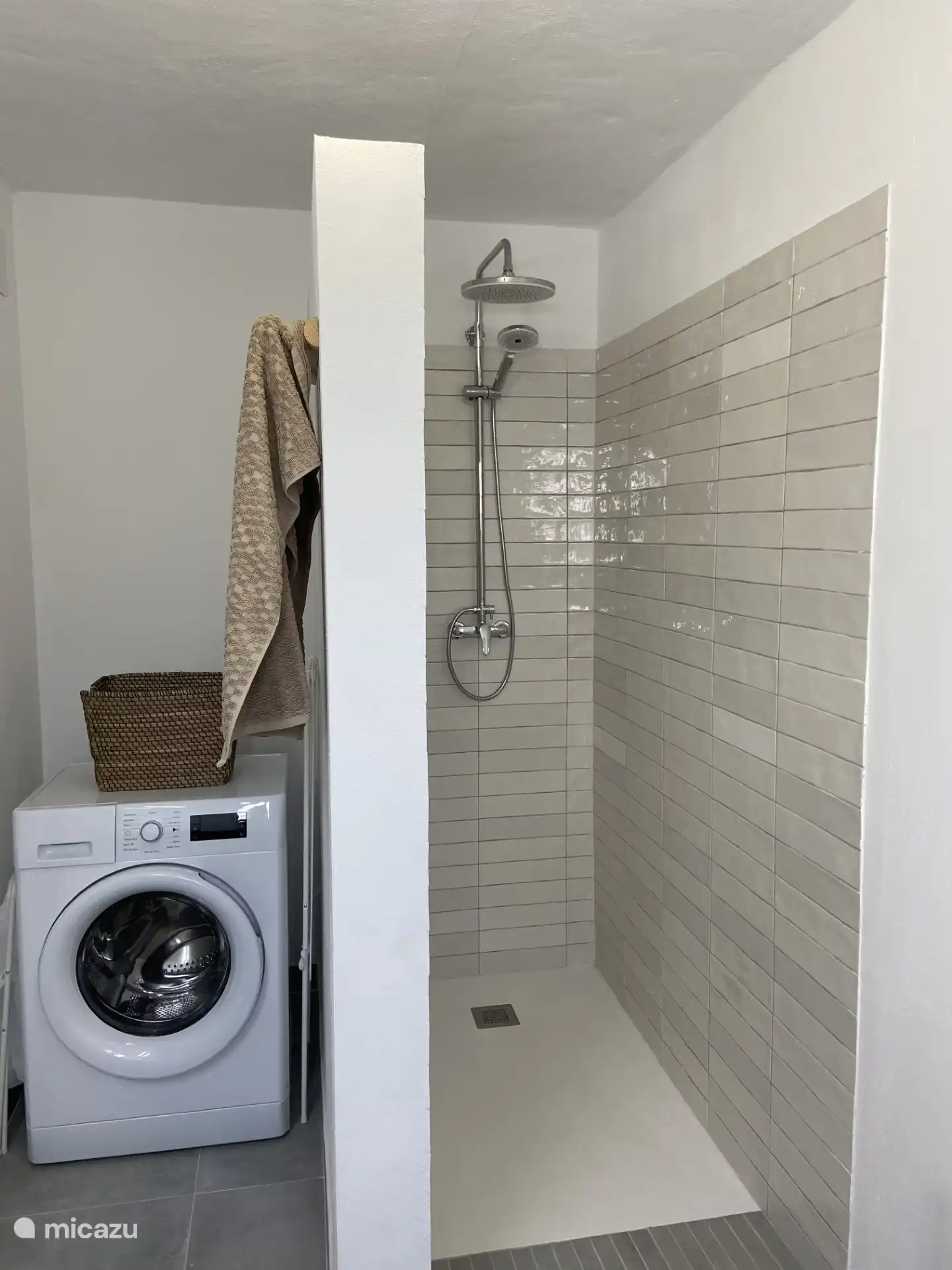 bathroom with washing machine