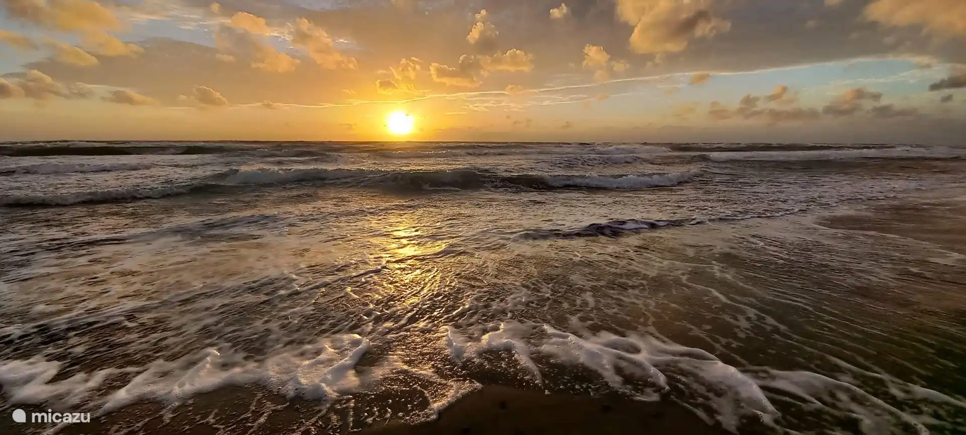 Zonsondergang op het strand, 2,5 km van ons huis