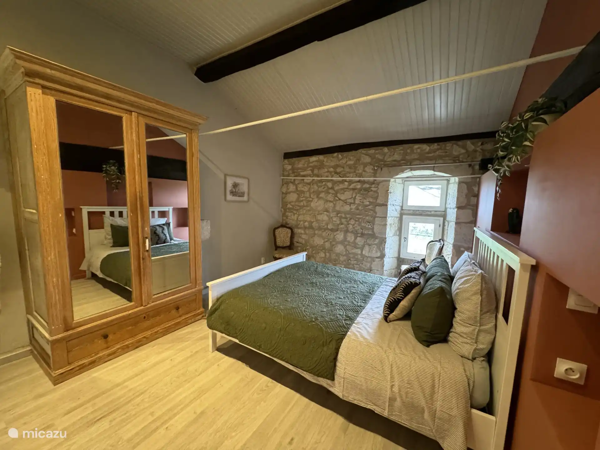 Bedroom on the first floor with double bed and ensuite bathroom.