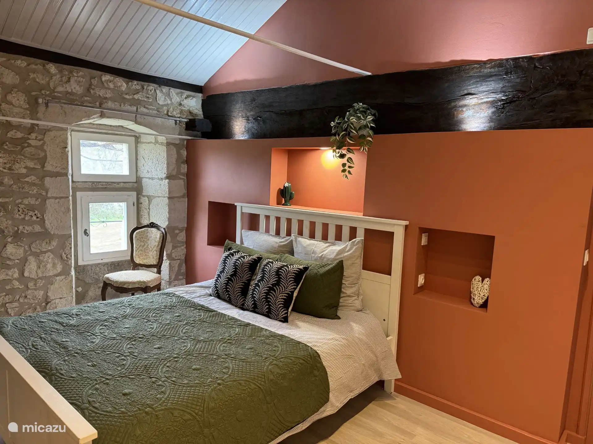 Bedroom on the first floor with double bed and ensuite bathroom.