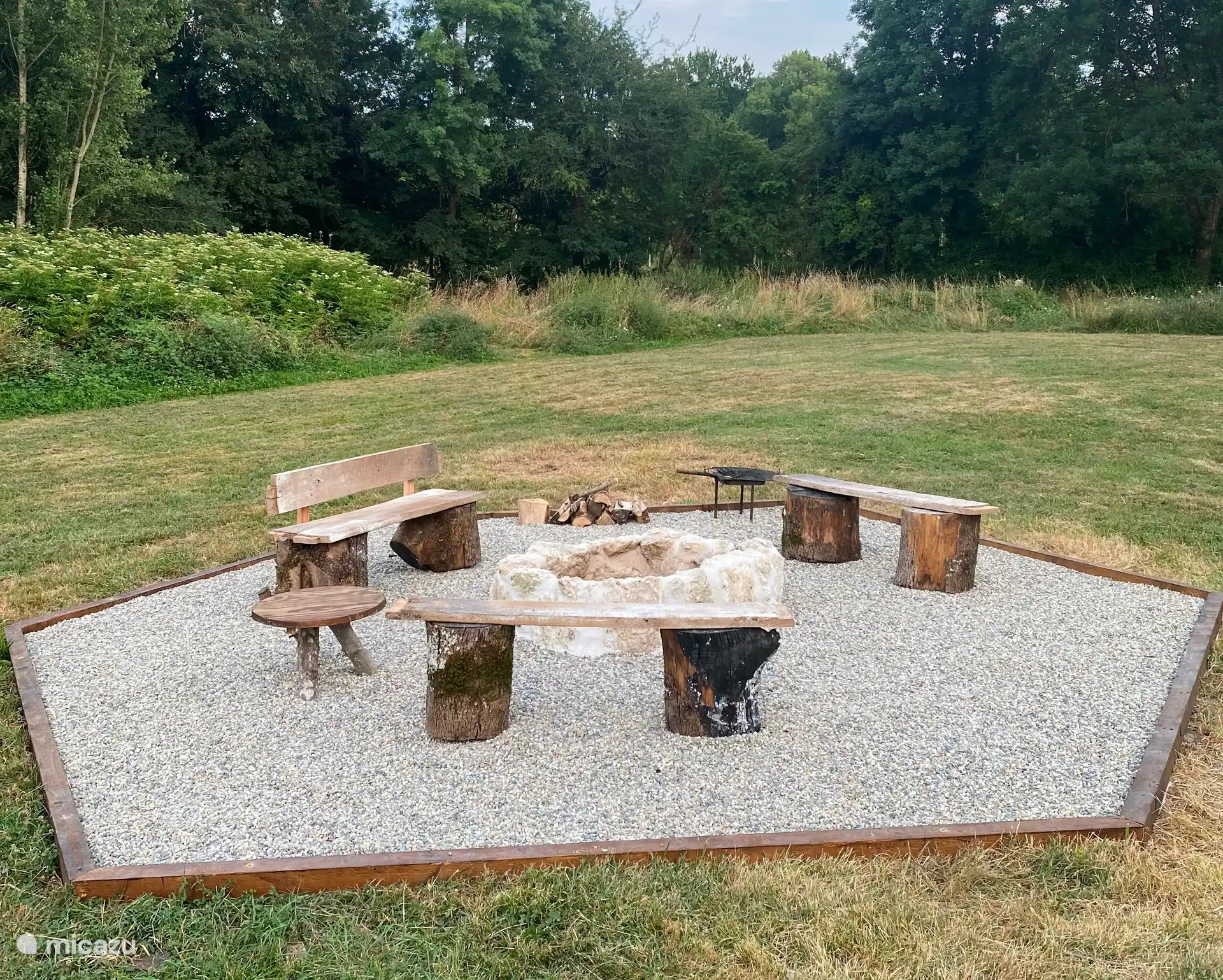 Atmospheric fire pit in the garden for cozy evenings.