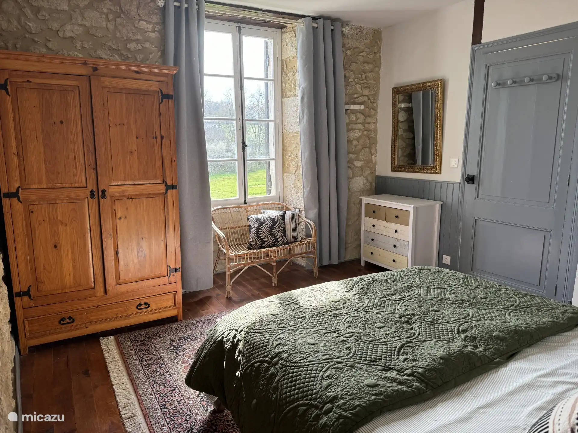 Bedroom on the ground floor with comfortable double bed and private bathroom. 