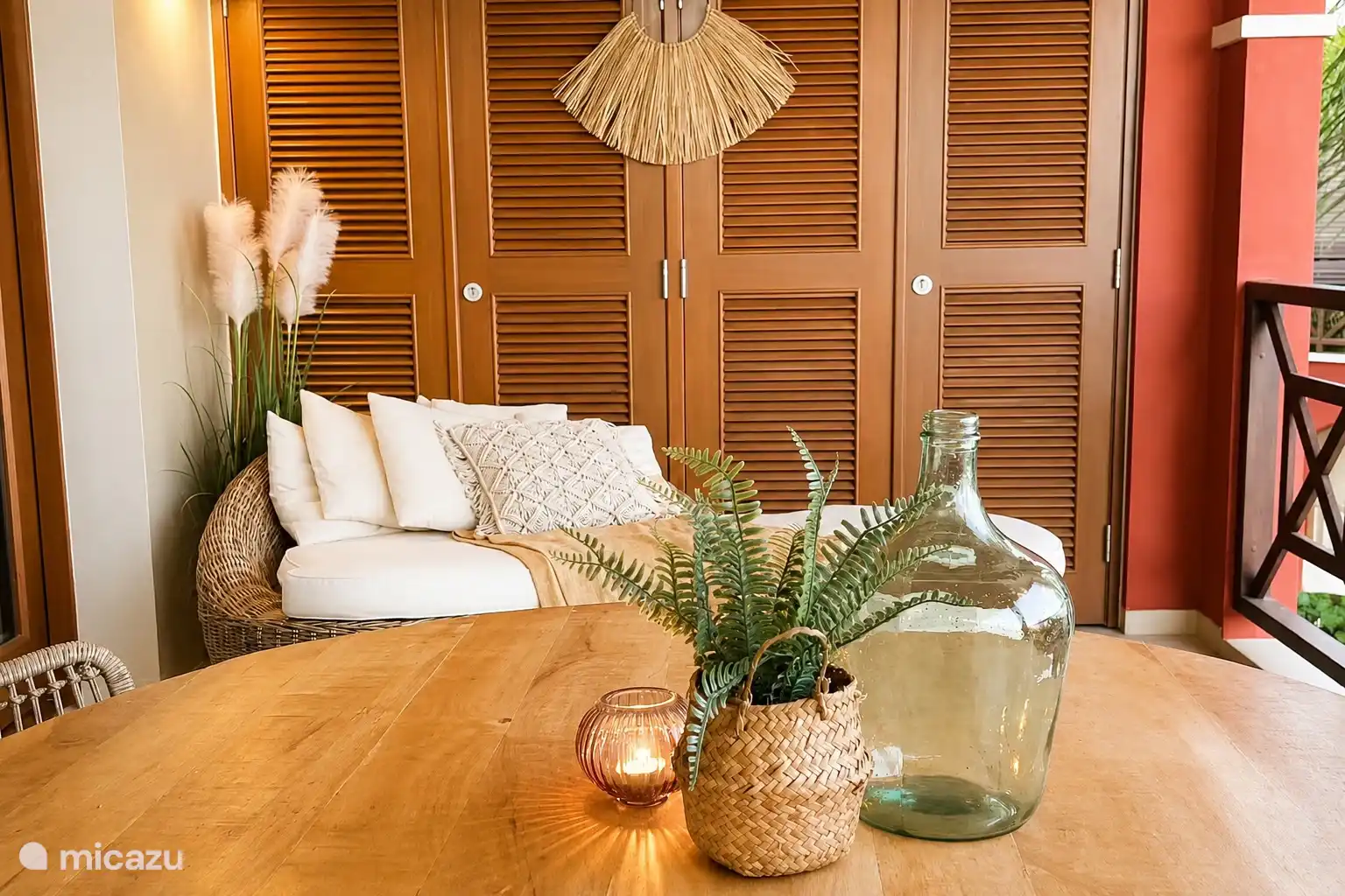 Attractively furnished sitting area inside with warm accents and cupboard space. A quiet place to retreat to.