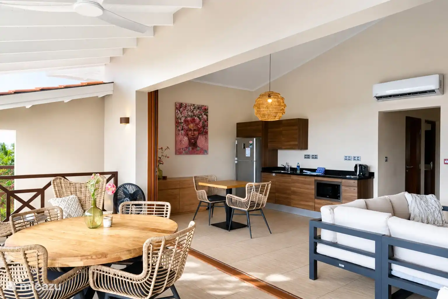 Balcony, sitting area and kitchen.