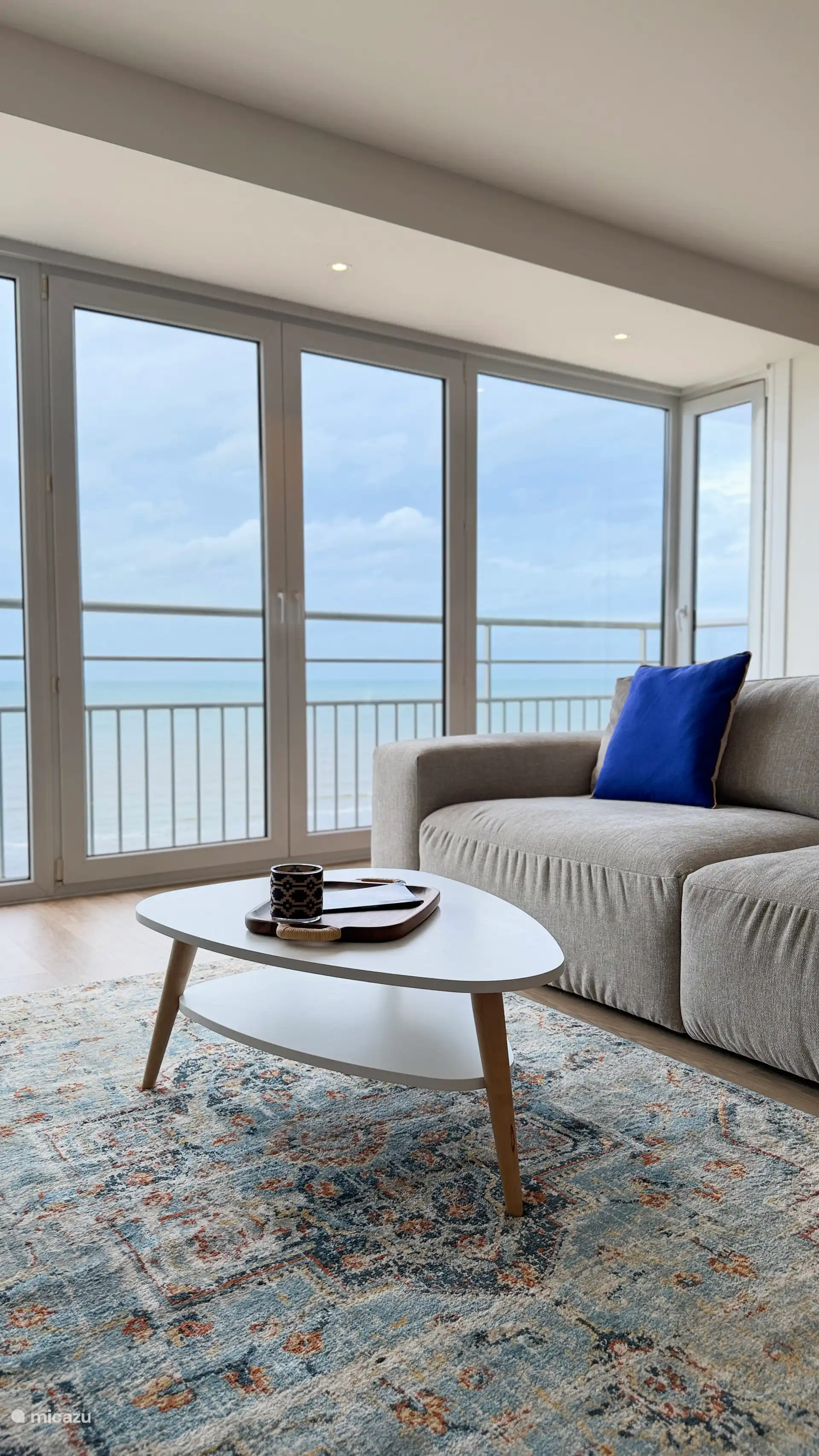 Living room with sea and beach views