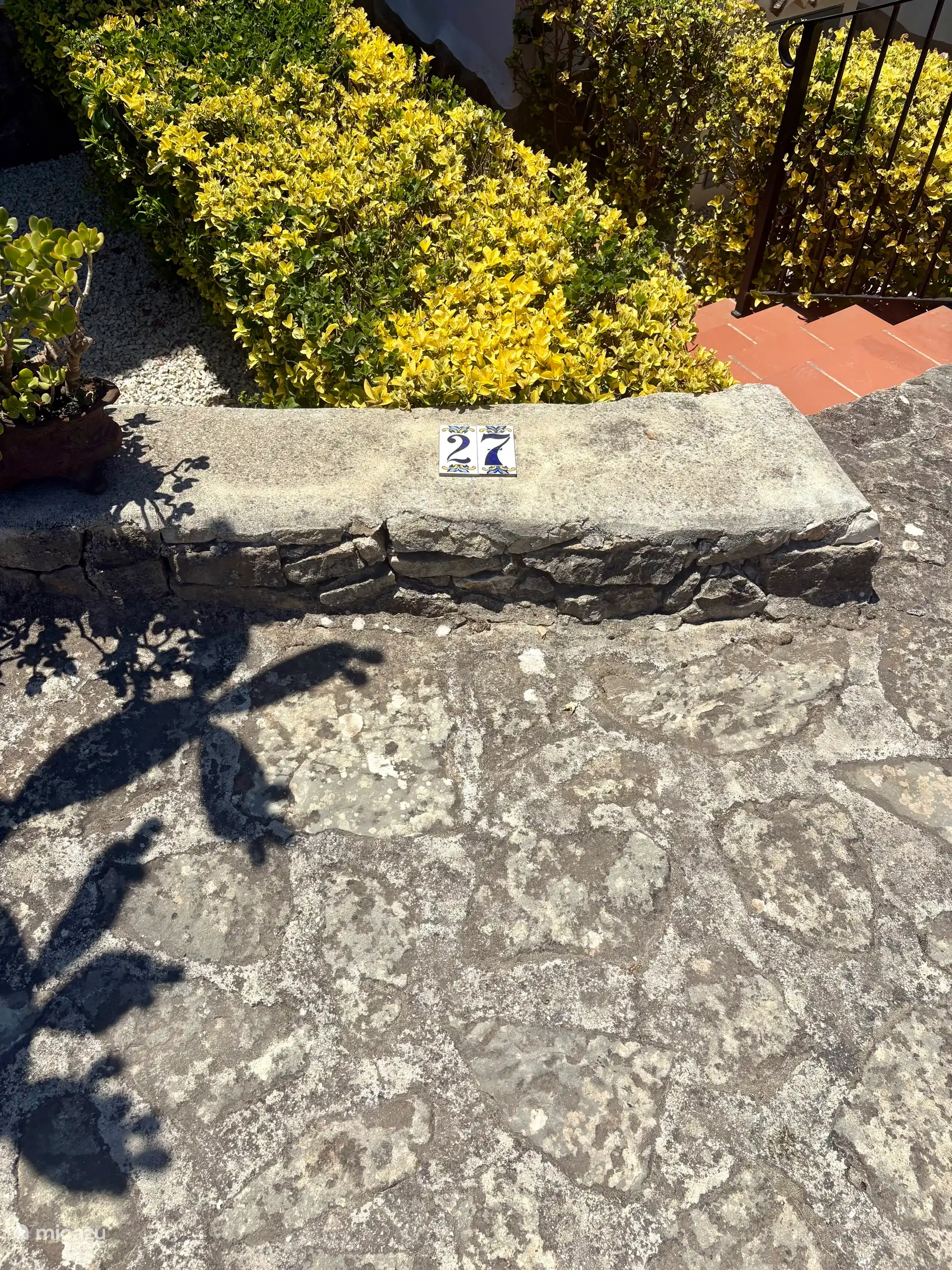 Private parking space - directly in front of the house, which is accessible via a staircase.