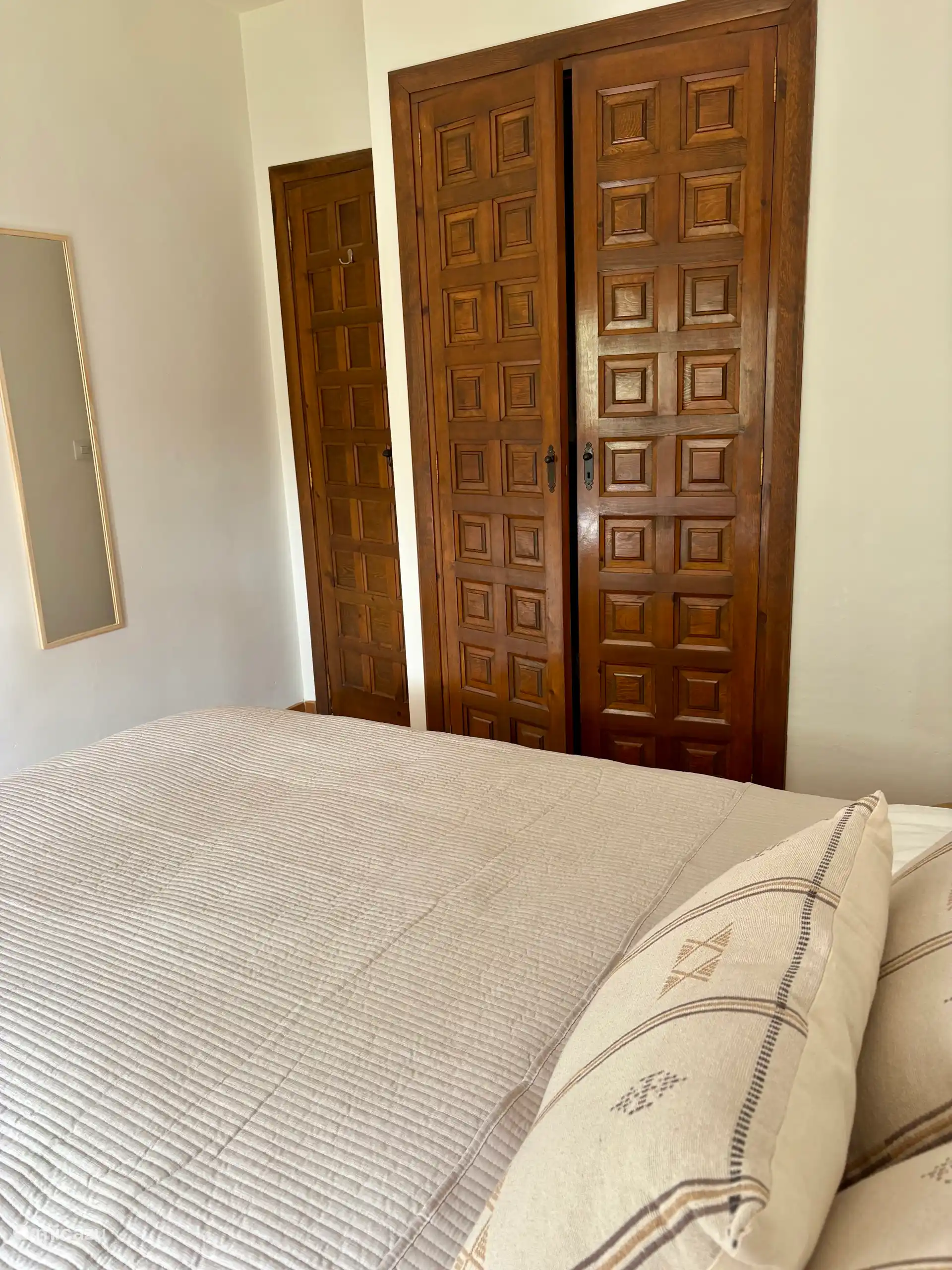 Bedroom 1 - traditional fitted wardrobe with ample clothes hangers - Bedroom 1