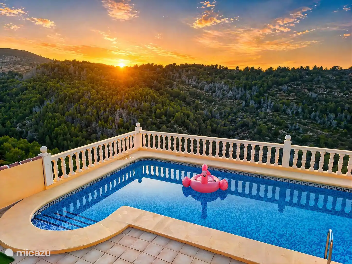 Swimming pool with sunset