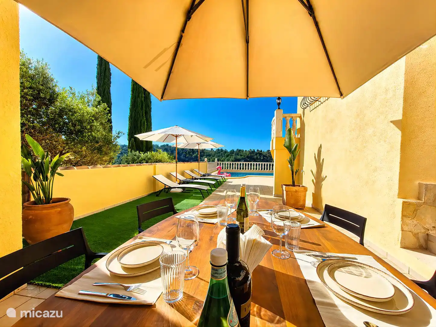 dining table and sunbeds 