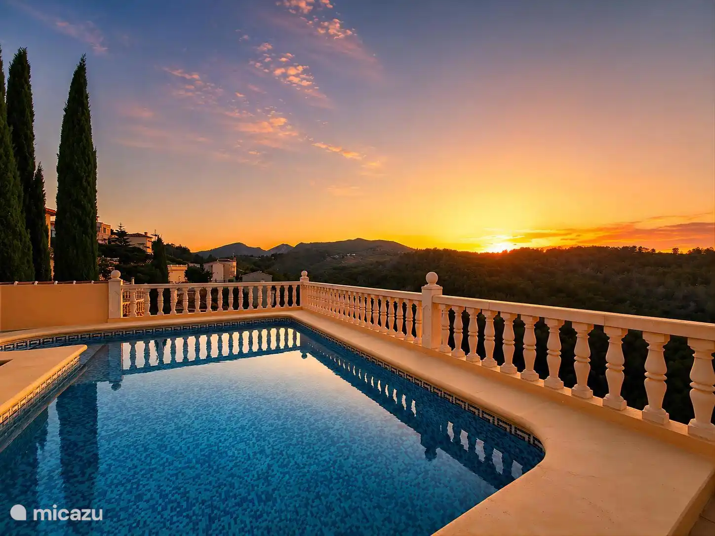 Swimming pool with sunset