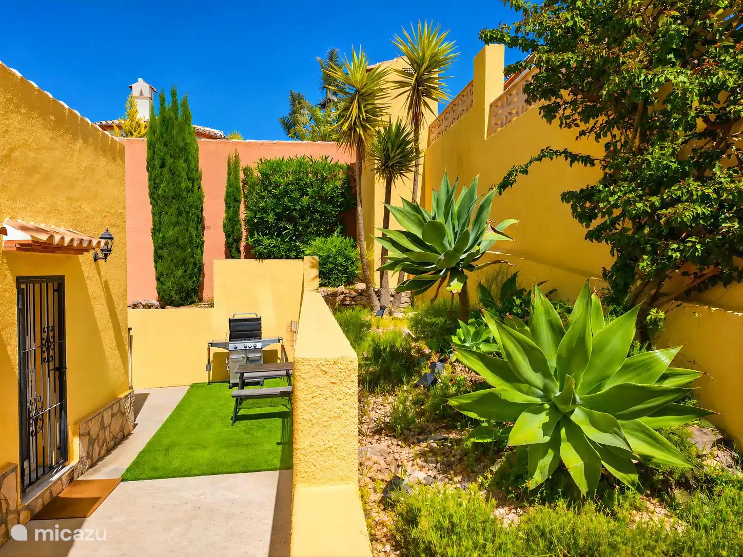 front garden with gas BBQ