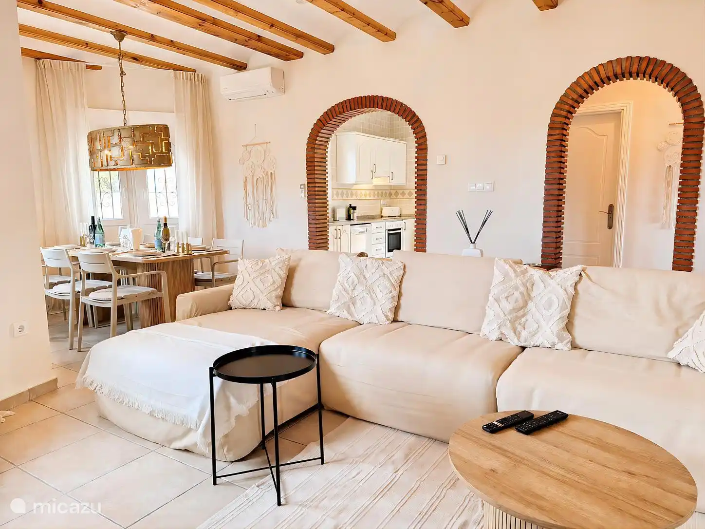 living/dining room with sofa and dining table