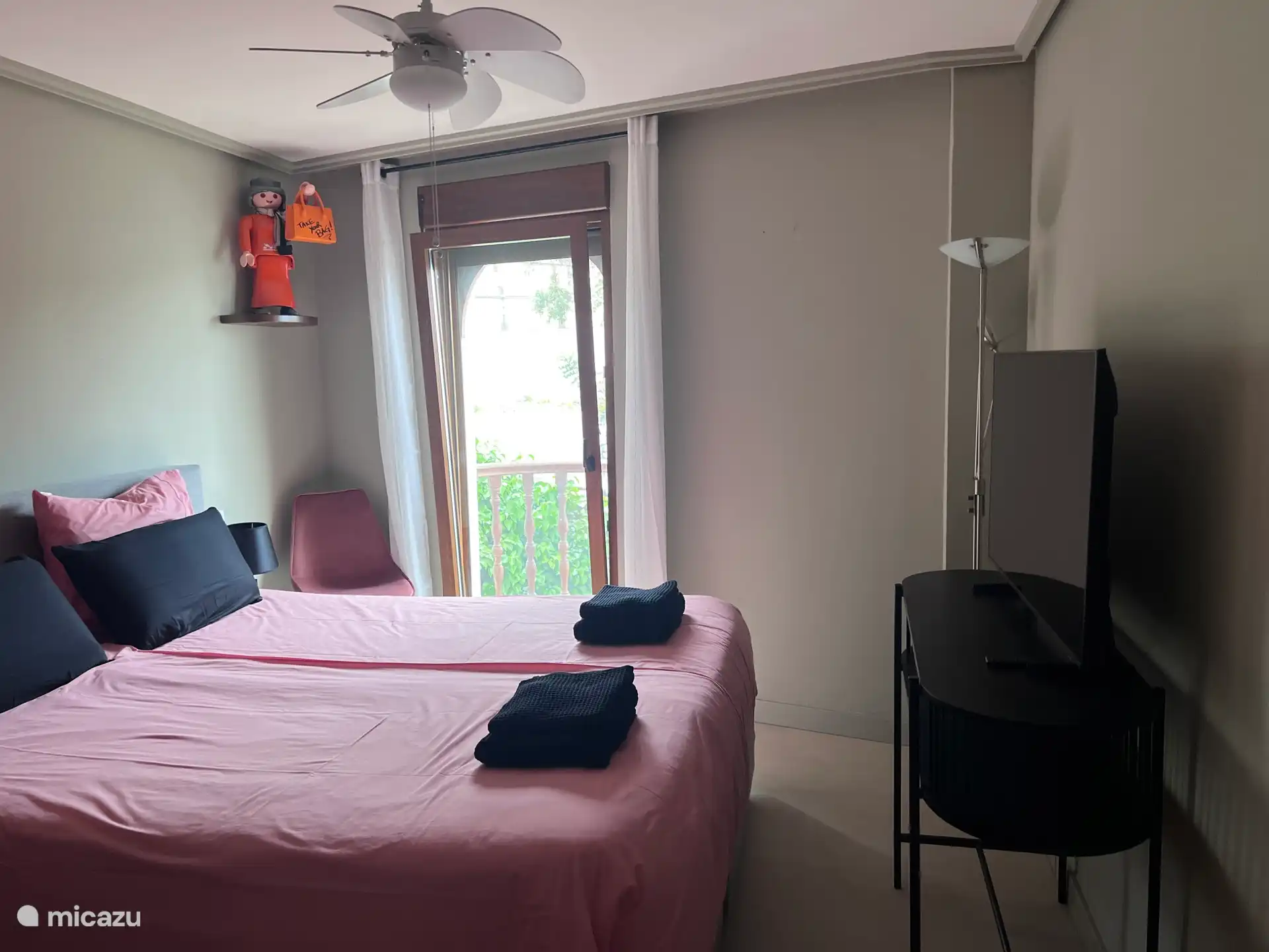 Second bedroom with fan 