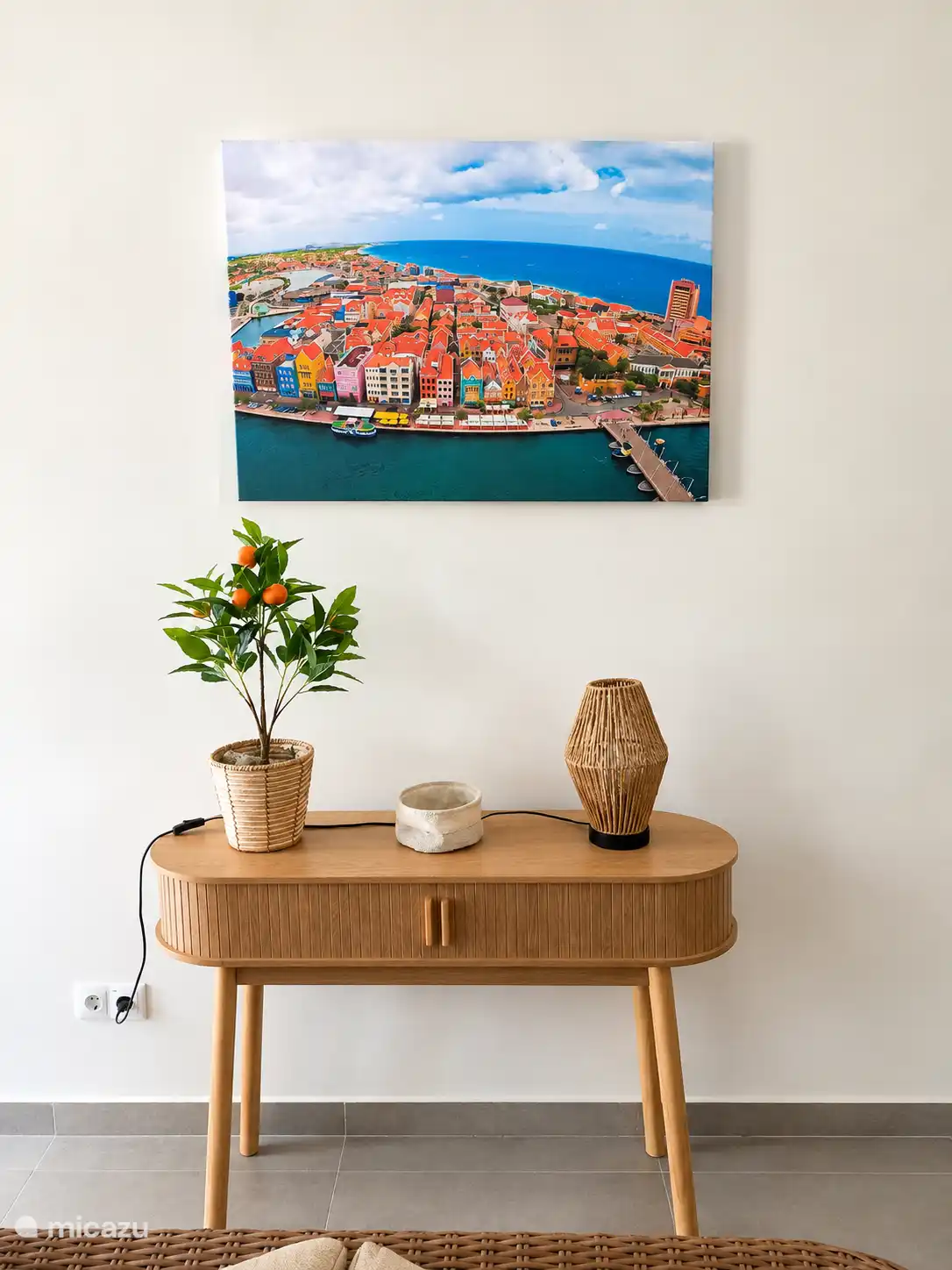 Side table with key basket and shopping bags (behind the sliding doors)
