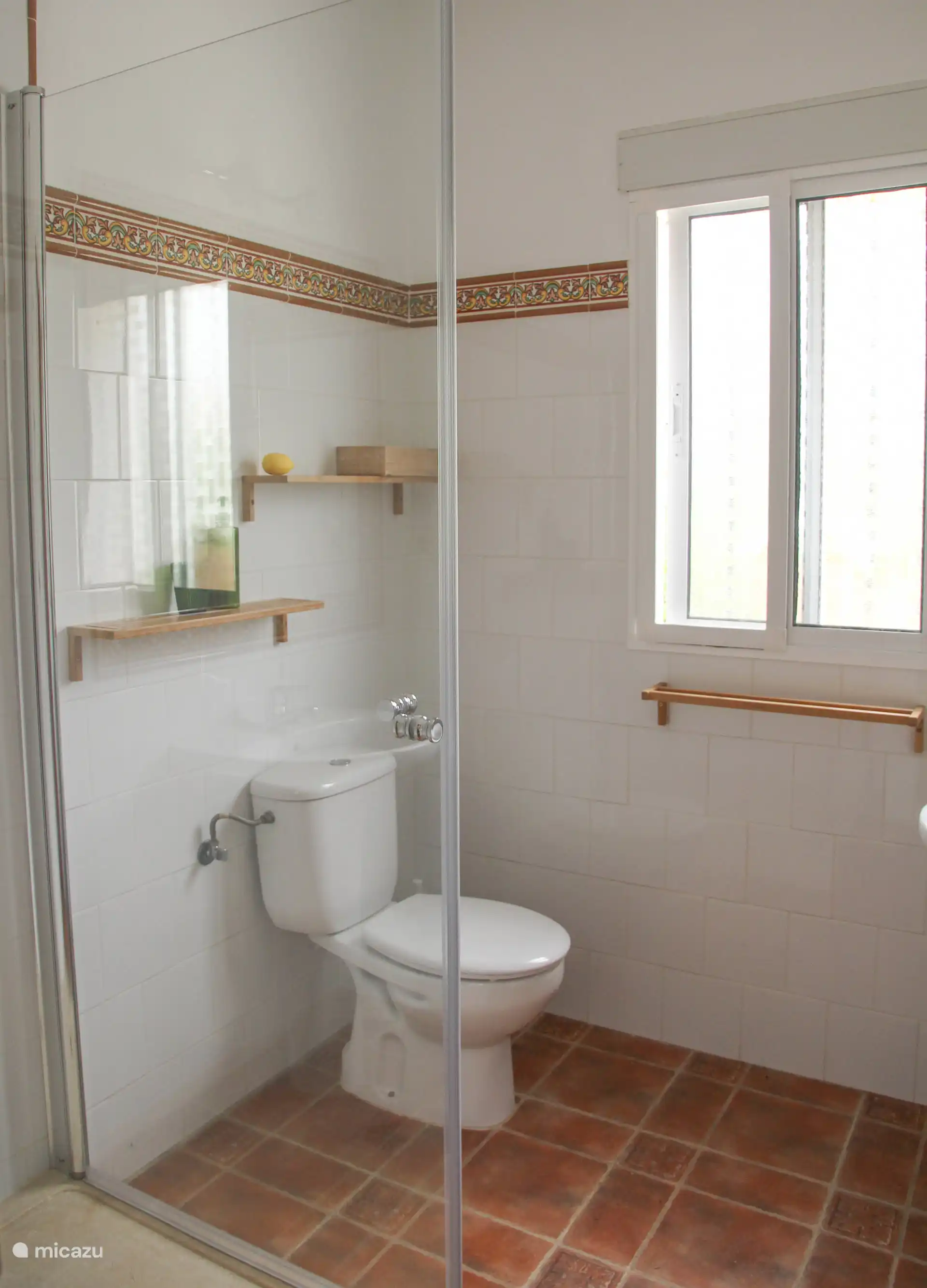 Bathroom in the Casita, shower cabin, sink and toilet