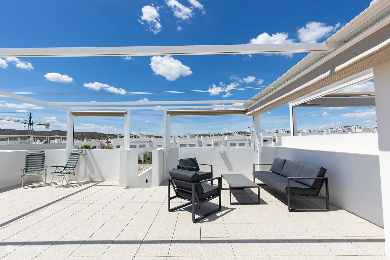 Terraza en la azotea con salón